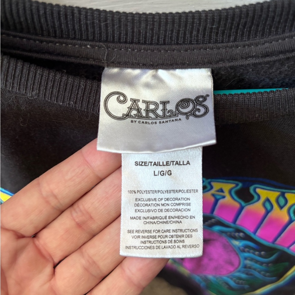 Woodstock Carlos by Carlos Santana Black Tee with Neon Graphic